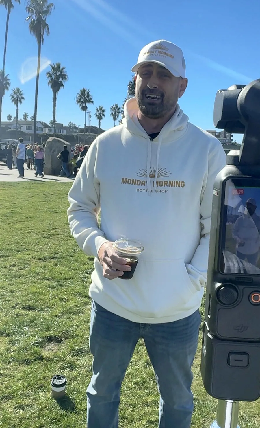 Filming a Monday Morning reel on a San Diego lawn with a gimbal camera