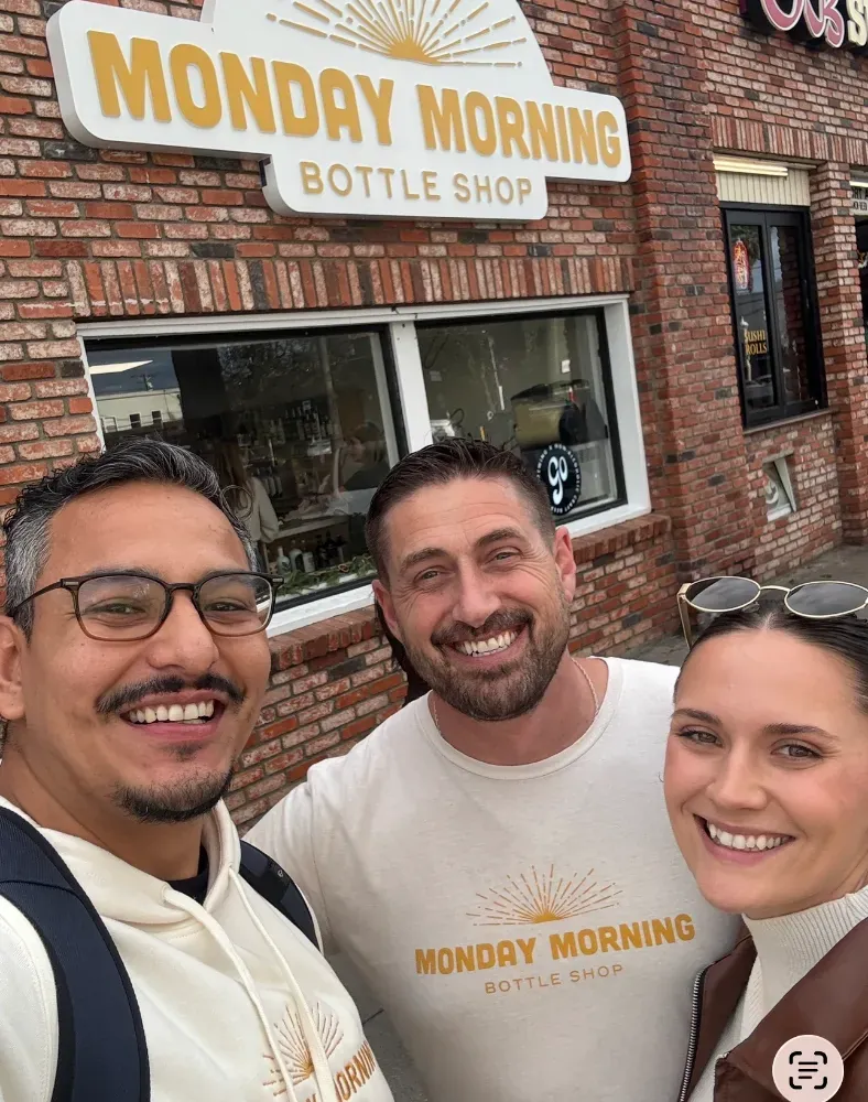 Danny with the Monday Morning team outside the bottle shop