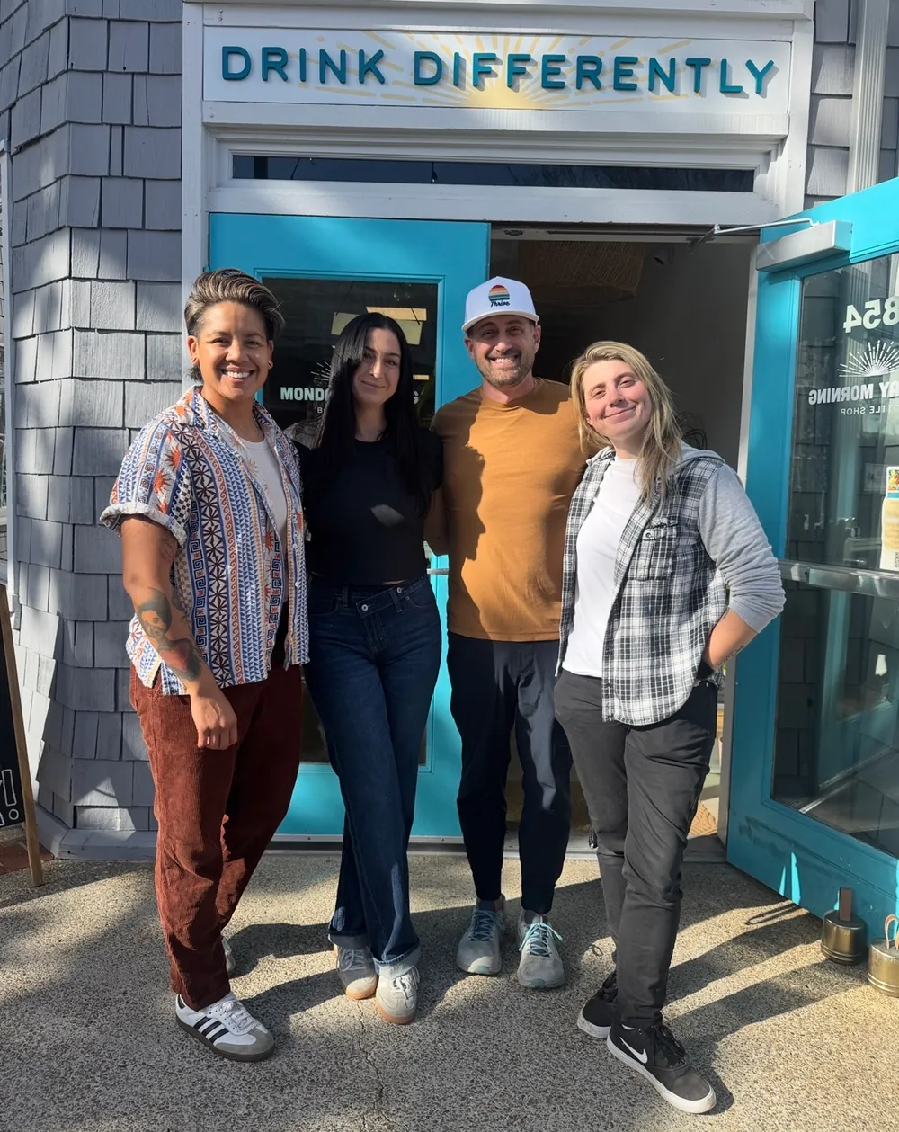The Monday Morning team outside one of their shops